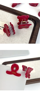 Deep red acetic acid hair clips featuring golden France handmade engraving detail