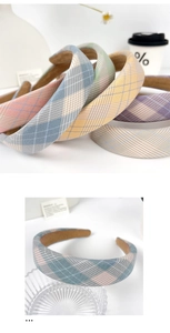 Detail of colorful plaid wide headbands showing premium fabric texture and thick design