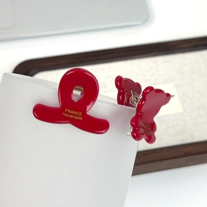 Red acetate heart and bear hair clips with gold France Handmade lettering in main view