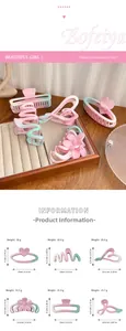 Detailed view of matte gradient hair claws in pink and mint green with size dimensions
