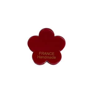 Elegant red acetate flower hair claw clip with golden handmade lettering and metal spring