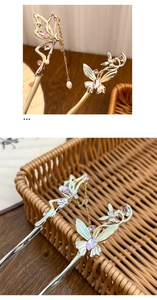 Detail of butterfly hairpins with pearl tassels and colorful marquise gemstones