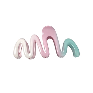 Elegant gradient hair claw clip in pink and green with a glossy finish for updos