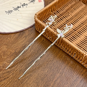 Elegant gold butterfly hairpins with pink crystals and long tassels for Hanfu styling