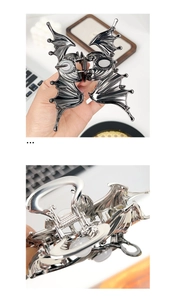 Makroansicht der Haarspange im Gothic-Fledermausflügel-Design aus dunklem Metall
