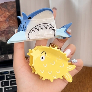 Cartoon ocean shark and pufferfish hair claws in vibrant acetate for women's hairstyling