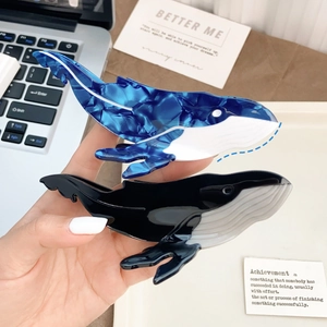 Ocean style whale claw hair clips in blue marble and black acetate for women's hair