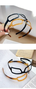 Detail of double-layer resin headbands with inner teeth in black and amber tortoiseshell
