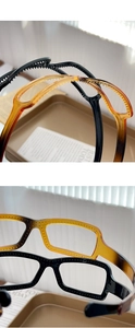 Detail of vintage glasses-frame headband with non-slip teeth in black and amber colors