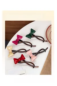 Set de cinco pinzas para el cabello de acetato con lazo en varios colores elegantes