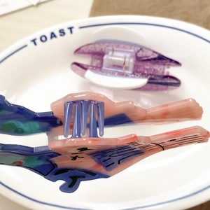 Chic acetate hair claw clips with CD record patterns in colorful artistic finishes