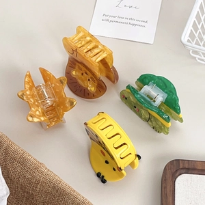 Cute cartoon animal acetate hair claws featuring lion and chick designs for women