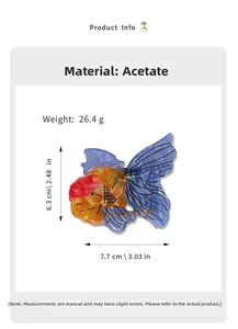 Detailed macro view of the acetate goldfish hair claw clip with blue and orange scales