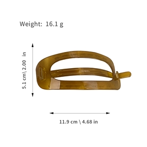 Minimalist amber oval hair claw clip with measurements 11.9 cm and 16.1 g weight