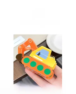 Detail of creative yellow excavator hair claw clip made of polished acrylic material