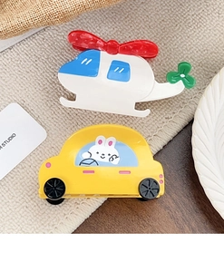 Creative cartoon hair clips featuring a white helicopter and a yellow car with bunny driver