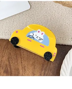 Close-up of yellow cartoon car hair claw featuring a cute rabbit driver design