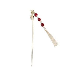 Elegant Chinese hair pin with red beads and long white tassel on minimalist silver rod