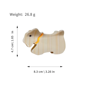 Pince à cheveux chien Scottie en acétate beige avec motif marbré et collier orange