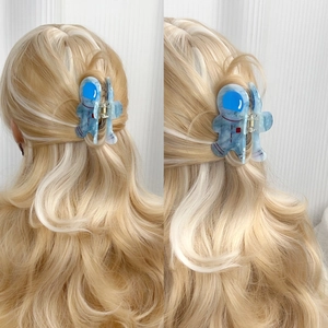 Cute astronaut acetate hair claw clip for women featuring blue marble texture finish
