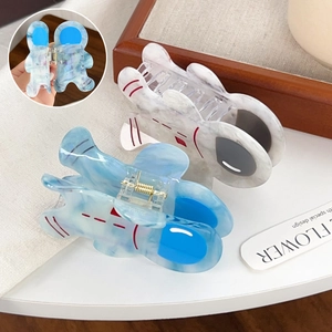 Cute astronaut acetate hair claw clips with marble texture in blue and creamy white colors