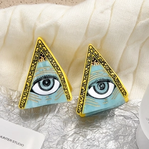 Lot de deux pinces à cheveux triangulaires en acétate avec motif marbré bleu et œil maléfique