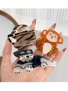 Detailed view of acetic acid hair claws in pig, monkey, and schnauzer animal shapes