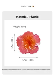 Macro detail of hibiscus hair claw clip showing size measurements and pink gradient color