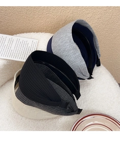 Detail view of retro wide knitted headbands with non-slip tooth combs in multiple colors