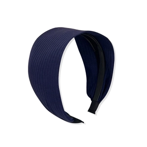 Navy blue knitted wide headband with ribbed texture and non-slip teeth for women