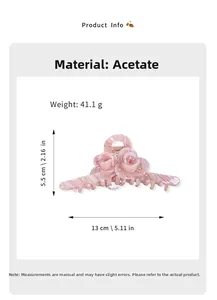Detailed size view of a pink marble acetate hair claw clip with double rose carvings