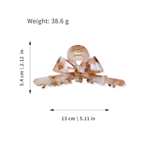 Grande pince à cheveux nœud en acétate motif écaille de tortue pour coiffure élégante