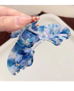 Detailed macro view of the pearlescent tulip hair claw clip in purple gradient