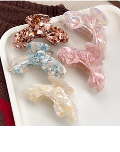 Detailed set of five acetic acid tulip flower hair claws with marble textures and colors