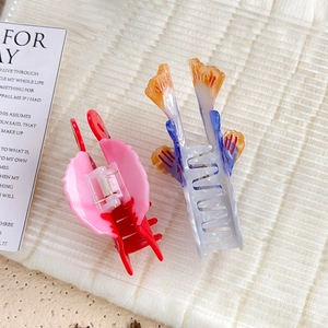 Colorful butterfly hair claw clips in dopamine style with vibrant acetate finish
