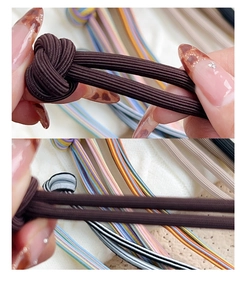 Close-up of high-elasticity braided hair tie being stretched to show durability