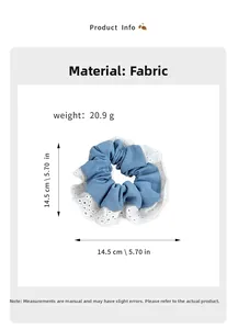 Detailed view of 14.5cm blue scrunchie with white lace edges and size measurements