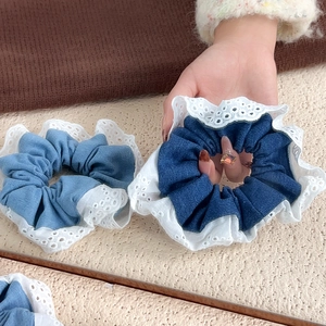 Set of denim lace scrunchies in light and dark blue for elegant ballet style hairstyles