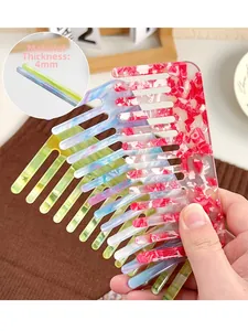 Detail view of 4mm thick marble texture acetate hair combs in various colors
