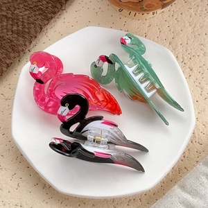 Elegant flamingo-shaped acrylic hair claws in marble pink green and grey finishes