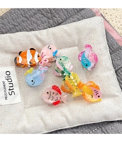 Mini sea creature acetate hair claws featuring clownfish and whale designs for girls