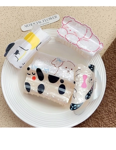Set of four pearlescent acrylic puppy hair claws with cartoon dog designs and cute bows