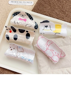 Set of five cute cartoon puppy hair claws in pearlescent acetate finish with diverse breeds