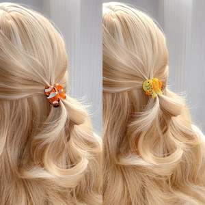 Cute fish shaped acetate hair claw clips for girls in orange and yellow colors