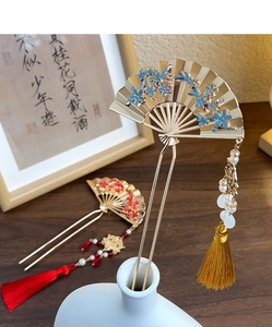 Detailed close-up of a Hanfu hair fork featuring a fan shape with enamel flower and pearls