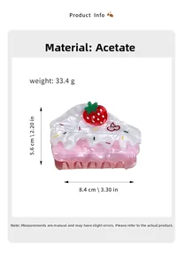 Detail of pink strawberry cake hair claw clip showing acetate material and dimensions