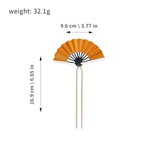 Traditional folding fan hair fork in orange yellow glaze with golden double prongs
