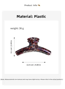 Detail view of large tortoise shell hair claw clip with specific size and weight data