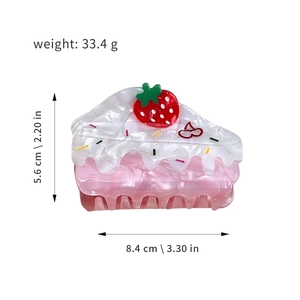 Sweet strawberry cream cake hair claw clip in pink acetate with dimensions 8.4cm x 5.6cm
