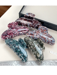 Set of five large hair claw clips with marble texture in various elegant colors